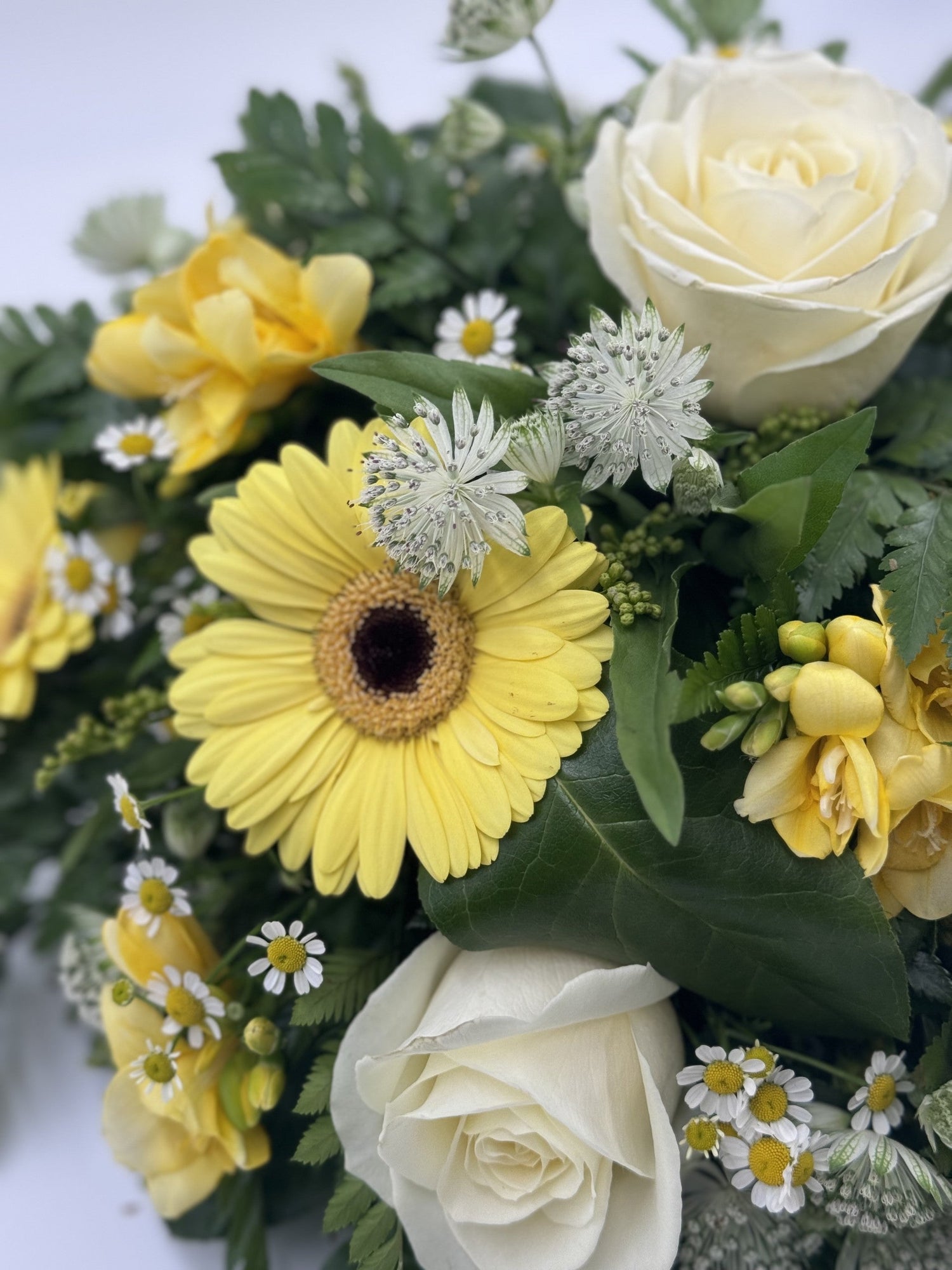 Capture the sentiment of a lost loved one with our Funeral Posy by Ram Florist. This tastefully arranged bouquet features a variety of beautiful flowers, all chosen to symbolize love, remembrance, and comfort. Honour your loved one