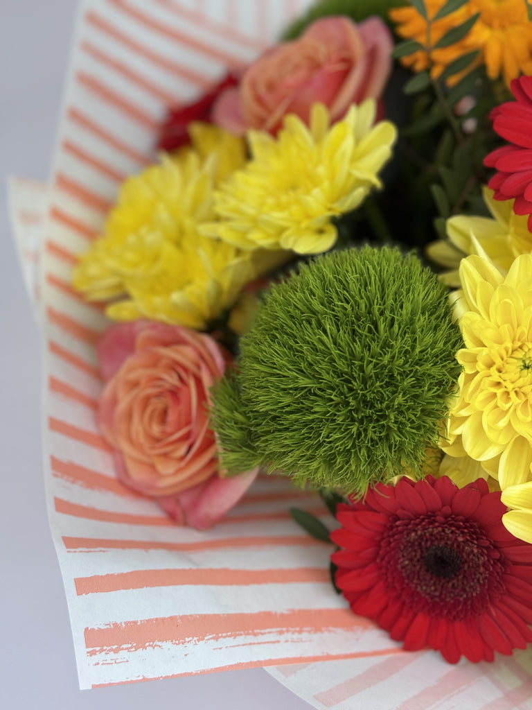 Vibrant hand tied - Rams florists