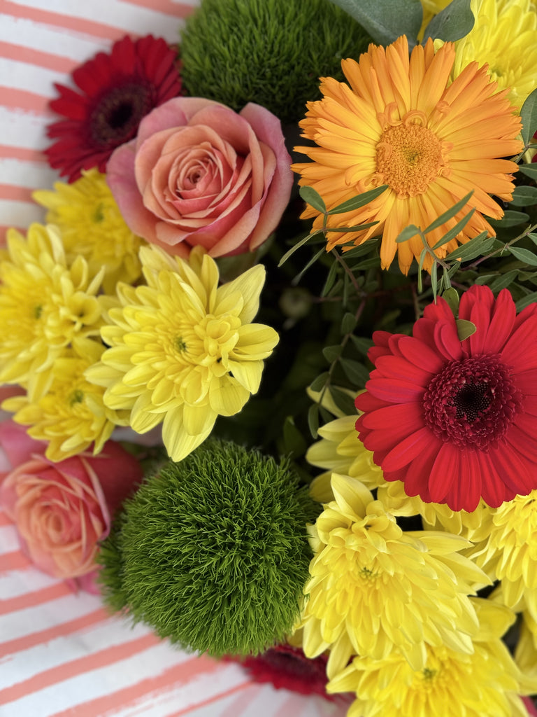 Vibrant hand tied - Rams florists