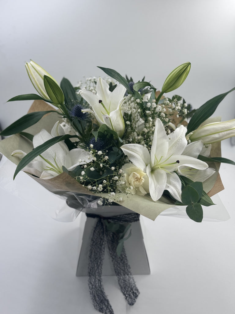 Sympathy Lily Hand tied Bouquet - Rams florists