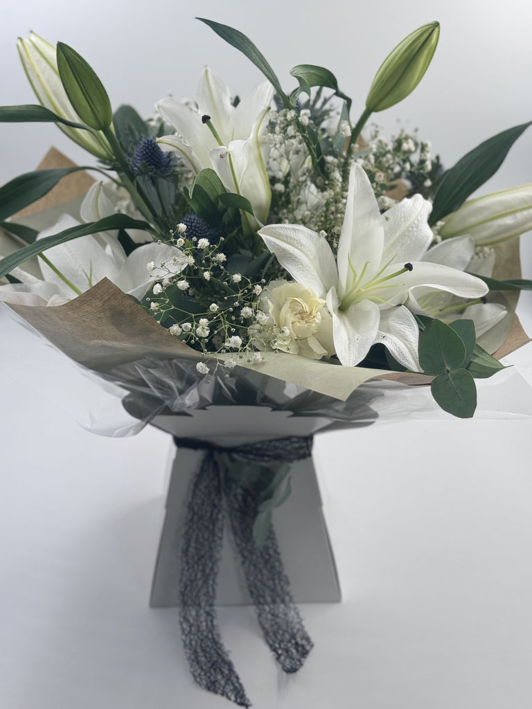 Sympathy Lily Hand tied Bouquet - Rams florists