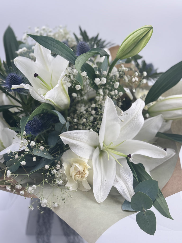 Sympathy Lily Hand tied Bouquet - Rams florists