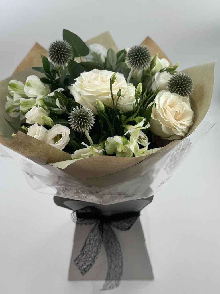 Sympathy Lily free Bouquet - Rams florists