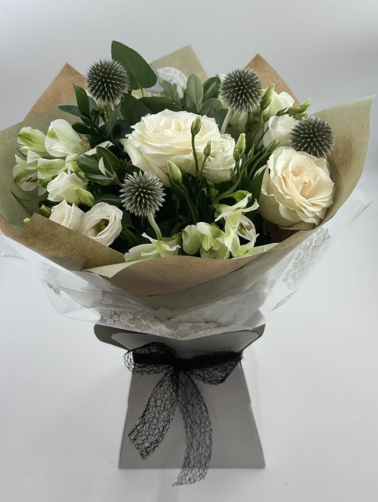 Sympathy Lily free Bouquet - Rams florists