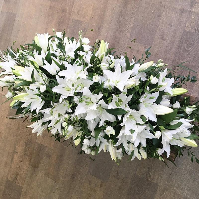 LILY CASKET SPRAY - Rams florists