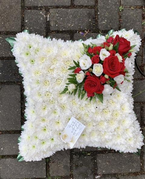 Cushion tribute flowers - Rams florists