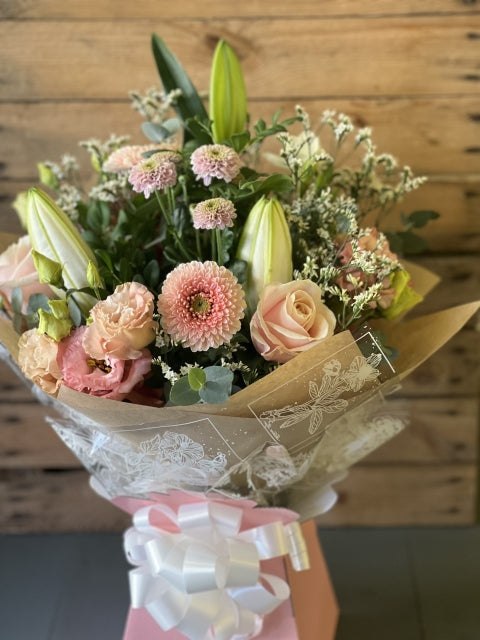 Pastel Hand tied bouquet made with the finest flowers