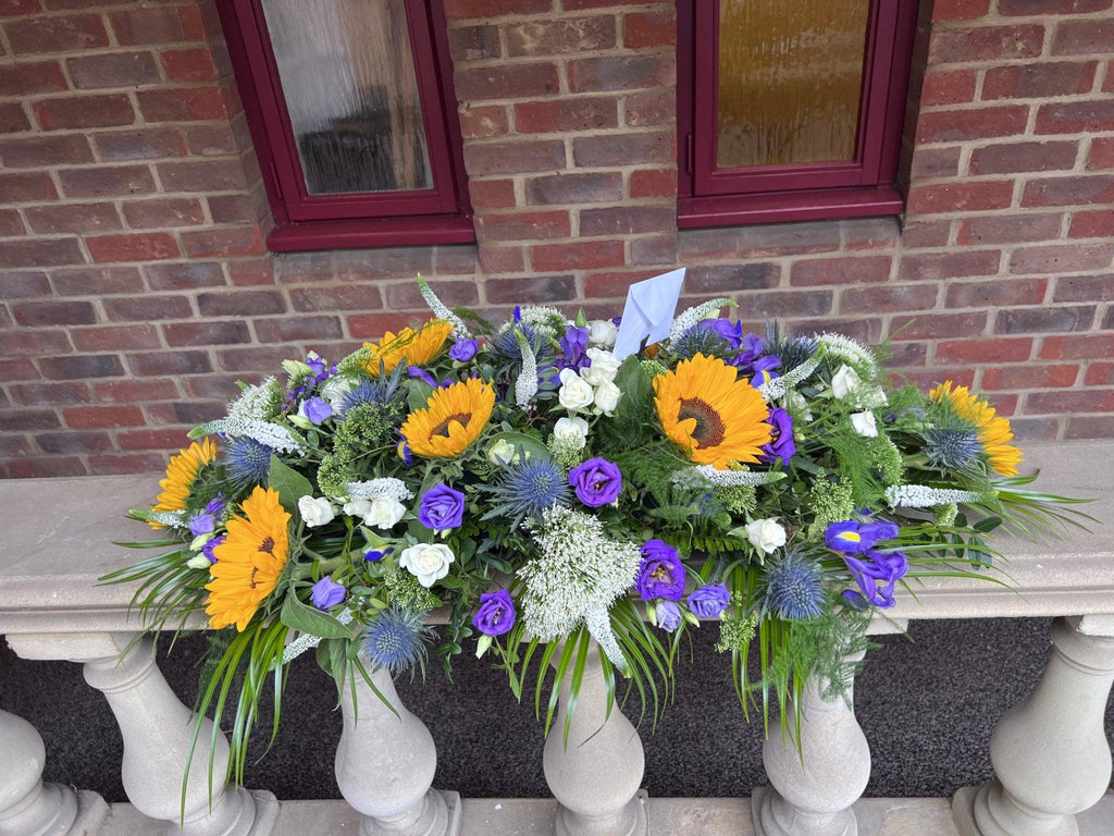 Sunflower with eryngium Spray - Rams florists