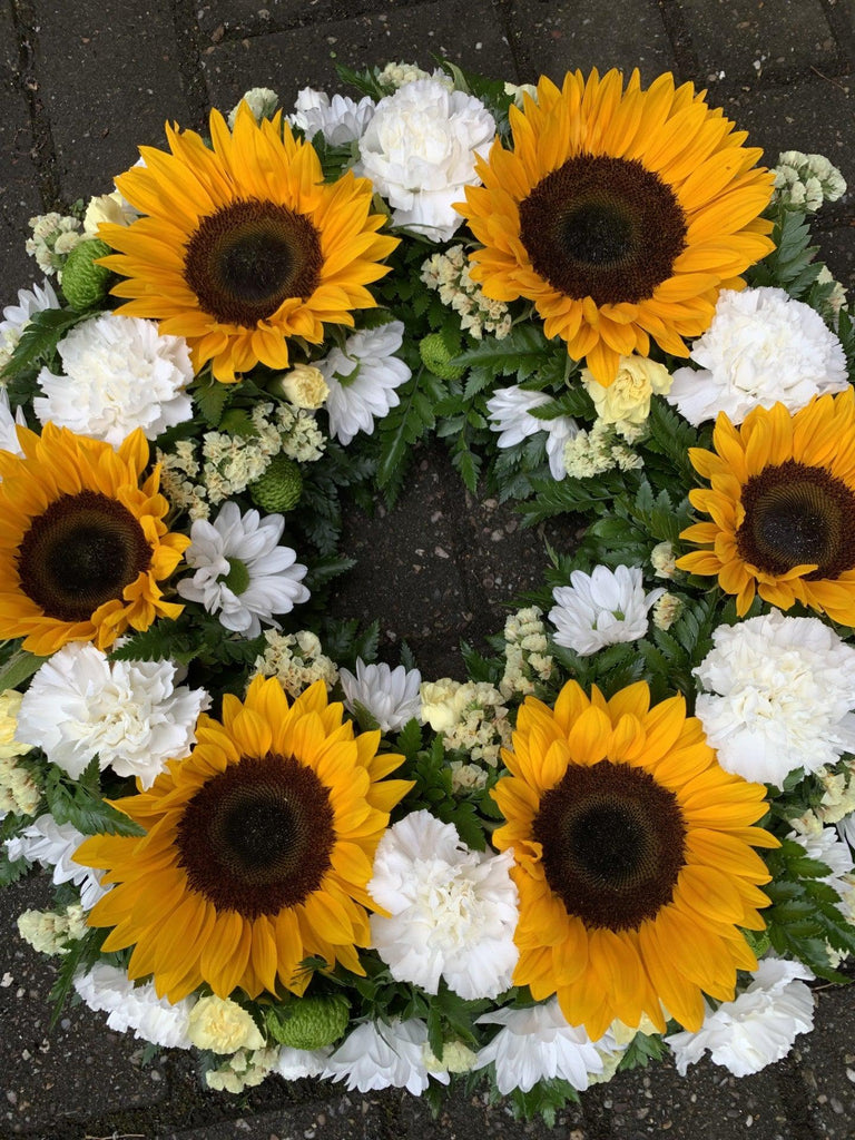 Sunflower & carnation Wreath - Rams florists